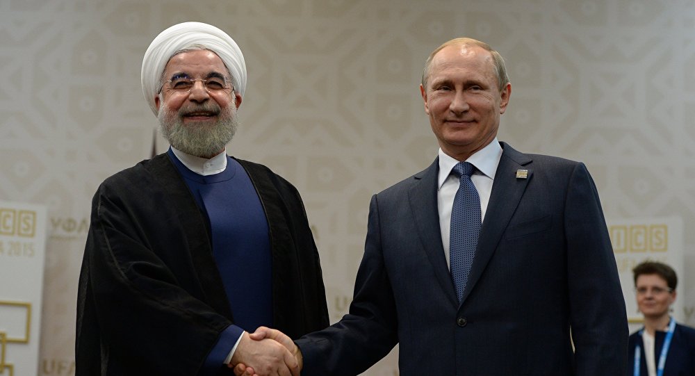 بوتين يلتقي روحاني ويؤكد على أهمية الاتفاق النووي