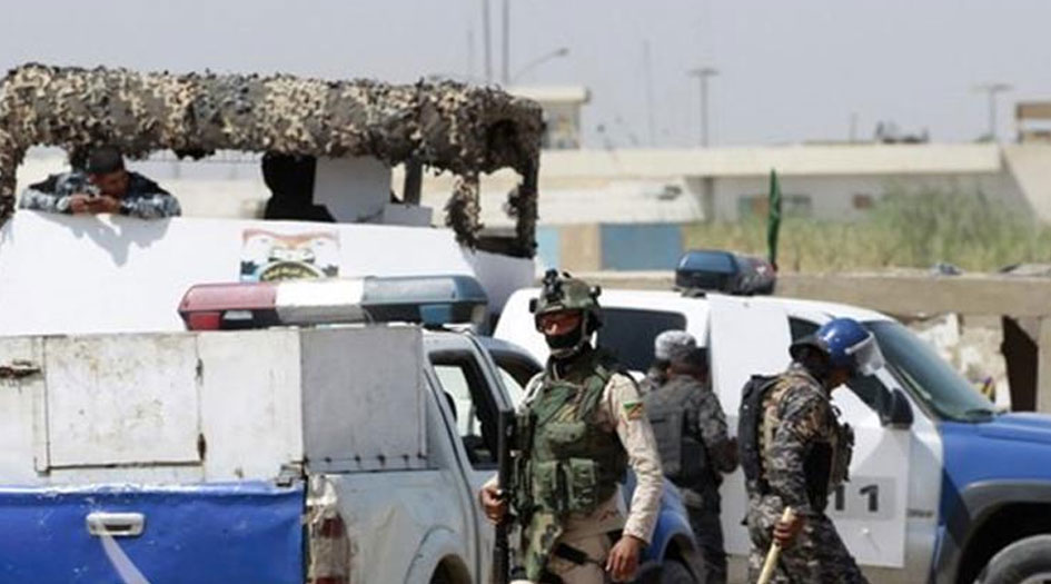 قوة أمنية تفكك عبوة ناسفة داخل باص صغير في مرآب وسط بغداد