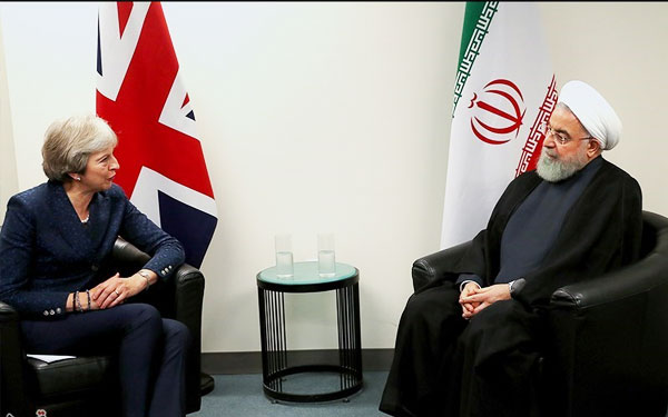 روحاني يبحث مع "تيريزا ماي" الاتفاق النووي