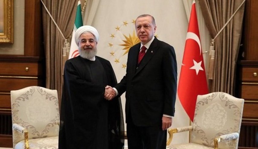 الرئيس التركي يستقبل الرئيس روحاني رسميا في أنقرة