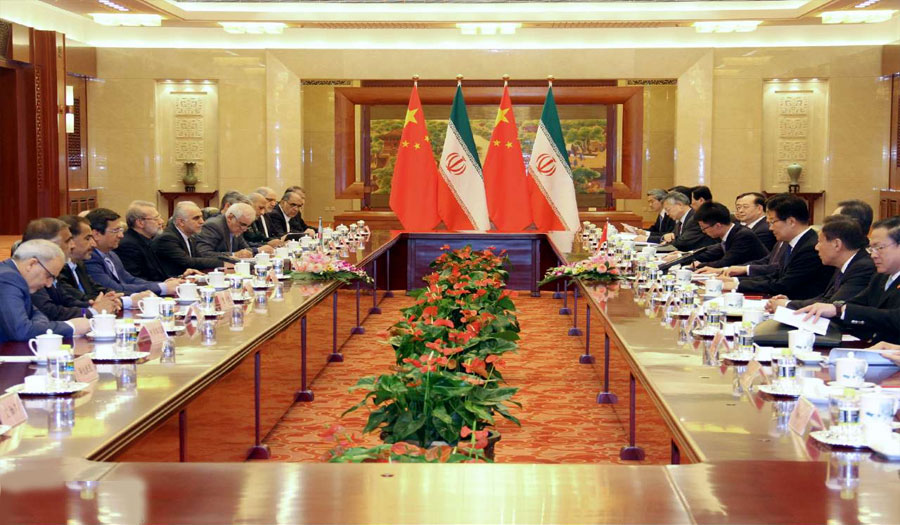 الصين وإيران تؤكدان استمرار تعزيز العلاقات بين البلدين