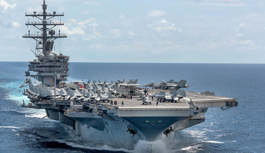 سفن صينية تحاصر حاملة طائرات أمريكية في بحر الصين 