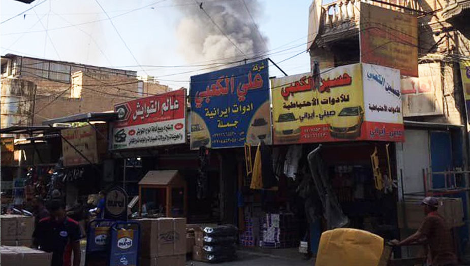 فرق الاطفاء تحاول اخماد حريق وسط بغداد