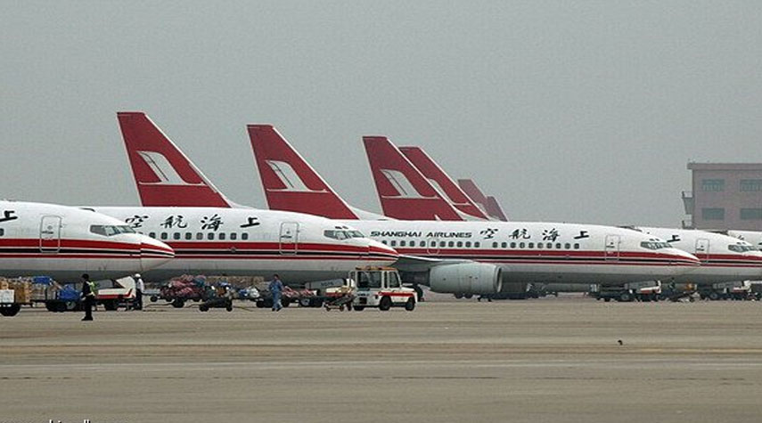 مسؤول فرنسي: الأميركيون يسرقون أقنعتنا من مطارات الصين