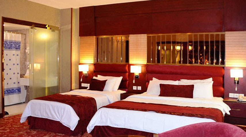 إيواء مؤقت لـ 900 زائر أجنبي في فنادق مدينة مشهد المقدسة