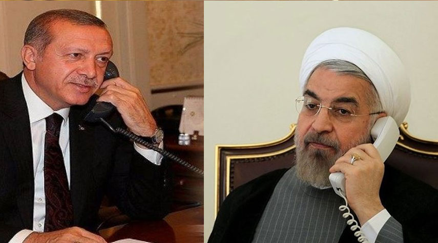 الرئيسان الايراني والتركي يؤكدان ضرورة إعادة فتح الحدود بين البلدين
