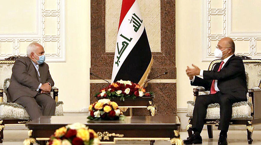 وزير الخارجية الايراني يلتقي الرئيس العراقي..ماذا دار بينهما؟