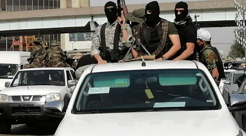 العراق... فصيل "ربع الله" يستعرضون بالسلاح في بغداد