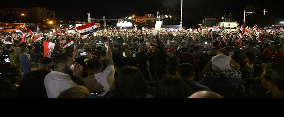 بالصور.. احتفالات واسعة تعم شوارع سوريا بفوز الرئيس بشار الأسد 