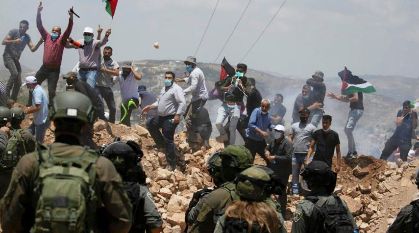 إصابات العشرات بقمع مسيرة في فلسطين المحتلة