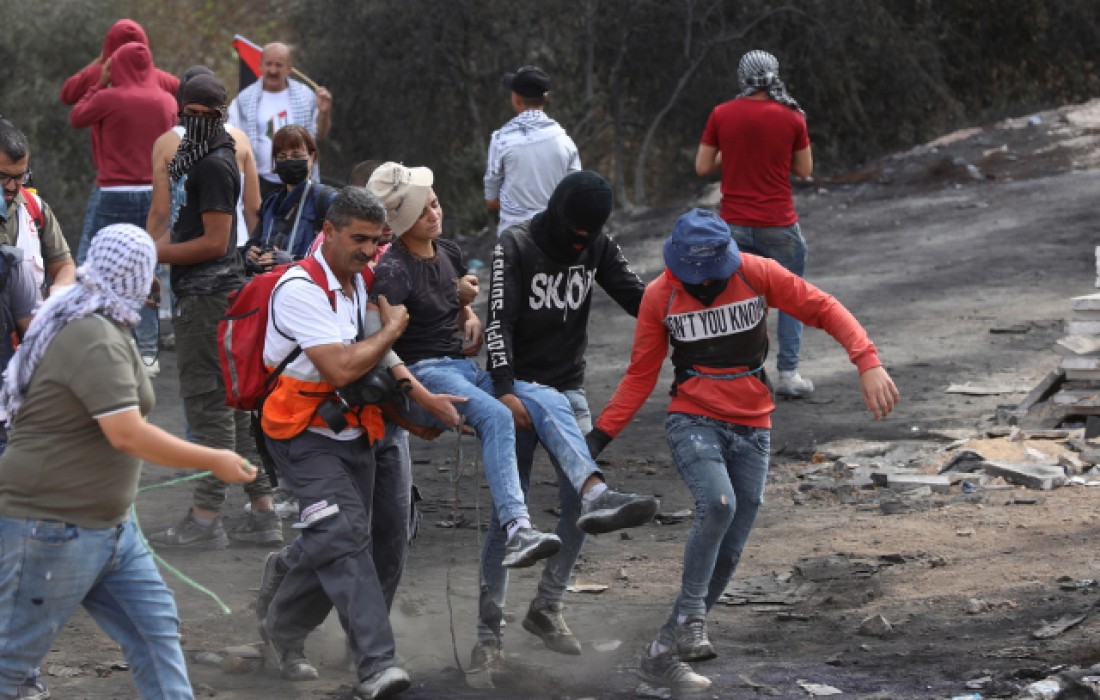 استشهاد فلسطيني واصابة 28 اخرين بمواجهات في بلدة بيتا 