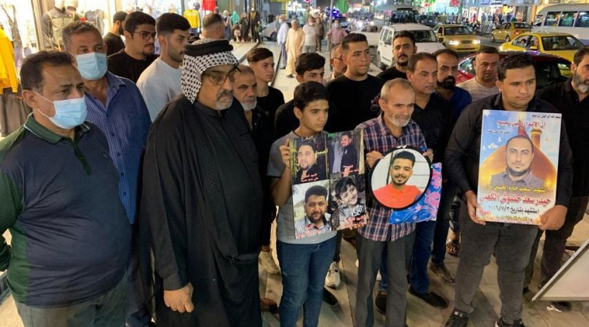 بالصور..عائلات شهداء تفجير الكرادة ببغداد يطالبون بإعدام الإرهابي "الزوبعي"