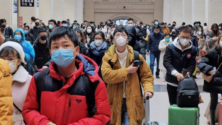 الصين تدعو مواطنيها العمل عن بعد لمنع انتشار كورونا
