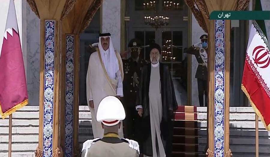 الرئيس الإيراني يستقبل أمير قطر رسميا