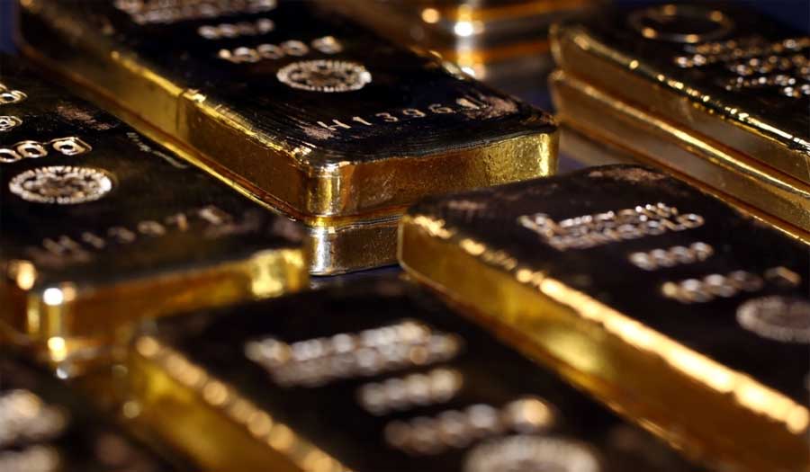 الذهب يرتفع نتيجة عمليات شراء وتراجع الدولار