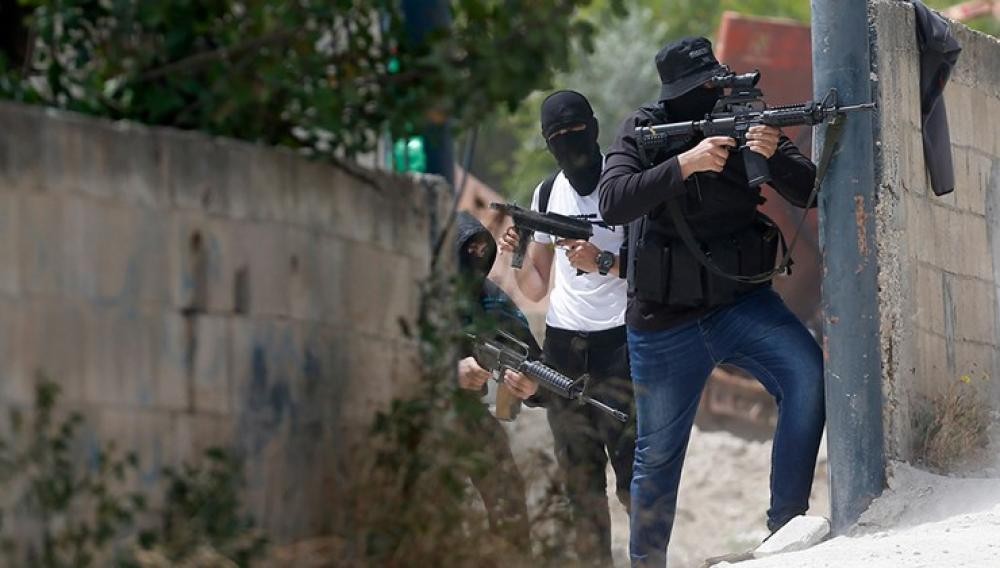 اشتباكات مسلحة في نابلس وحملة اعتقالات بالضفة