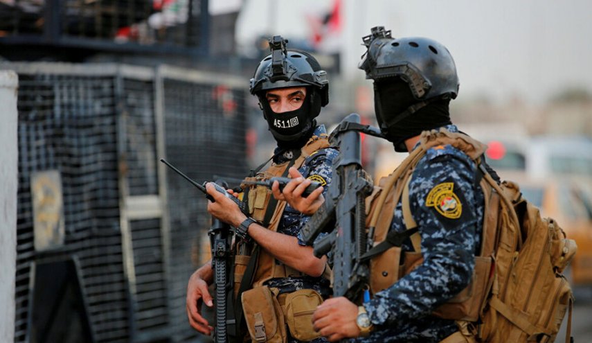 الأمن العراقي يعلن "الإطاحة بأحد أكبر مهربي العملة"