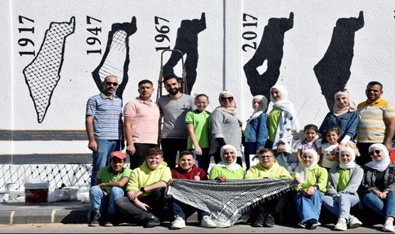 تضامنا مع فلسطين.. رسم لوحة جدارية بطول 20 متراً في حمص