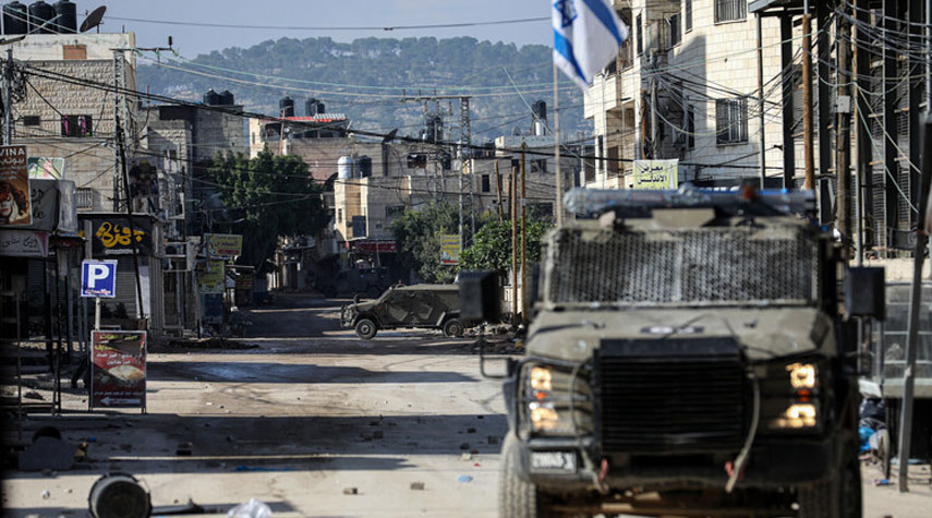 اشتباكات في جنين واقتحامات في نابلس ورام الله وتشديدات أمنية شرق القدس